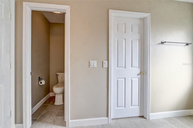 bathroom featuring toilet