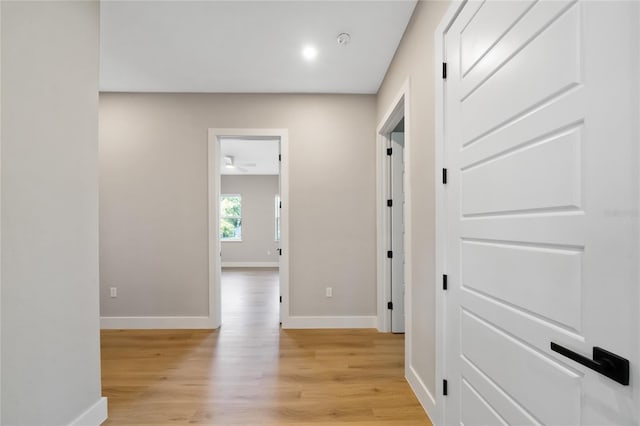 hallway featuring light wood-type flooring