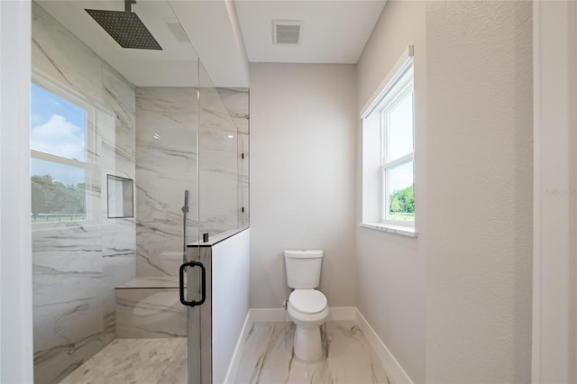 full bath featuring toilet, visible vents, baseboards, marble finish floor, and a marble finish shower