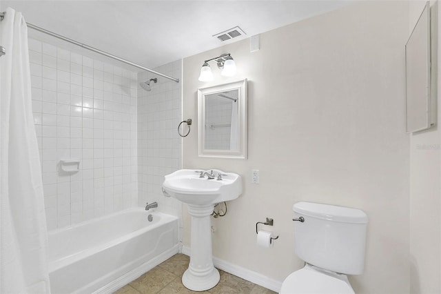 bathroom with shower / bath combination with curtain, visible vents, toilet, tile patterned flooring, and baseboards