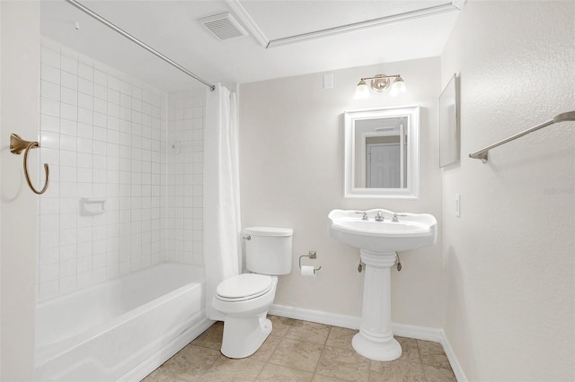 bathroom featuring visible vents, toilet, shower / bath combo with shower curtain, tile patterned flooring, and baseboards