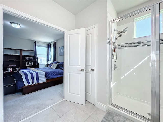 bedroom featuring light tile patterned floors