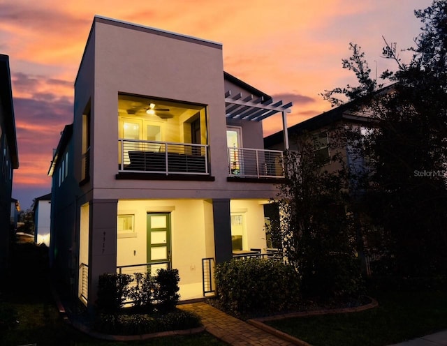 view of front facade featuring a balcony