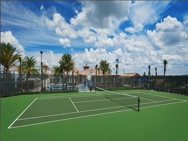 view of sport court featuring basketball hoop