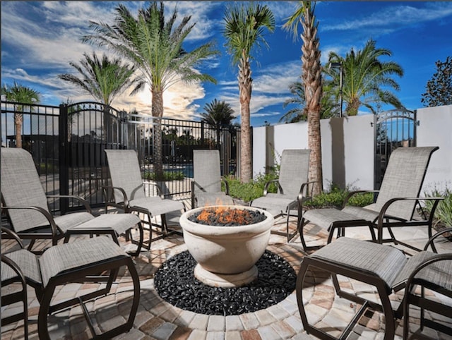 view of patio / terrace featuring a fire pit