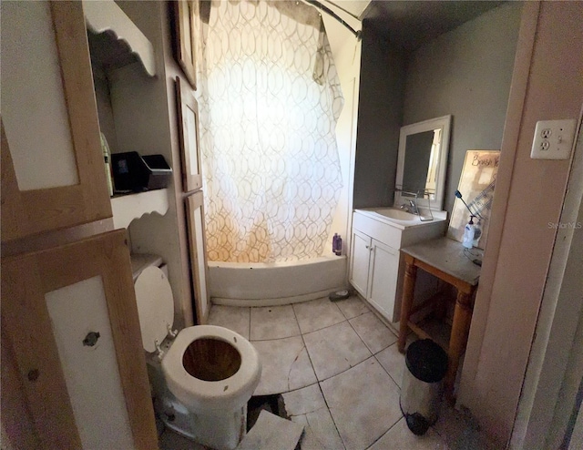 full bathroom with shower / bath combination with curtain, toilet, vanity, tile patterned floors, and plenty of natural light