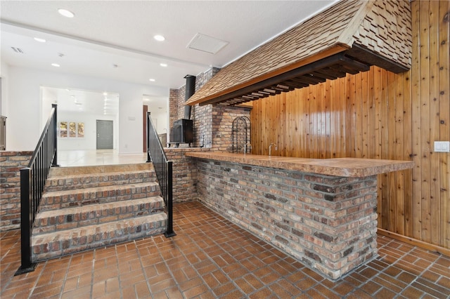 bar featuring wooden walls