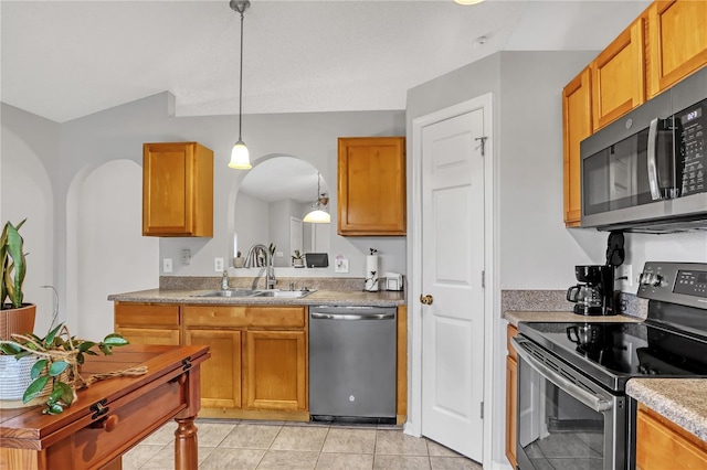 kitchen with sink, electric range oven, light tile patterned floors, stainless steel dishwasher, and pendant lighting