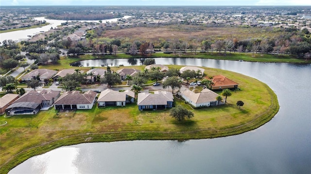 drone / aerial view with a water view