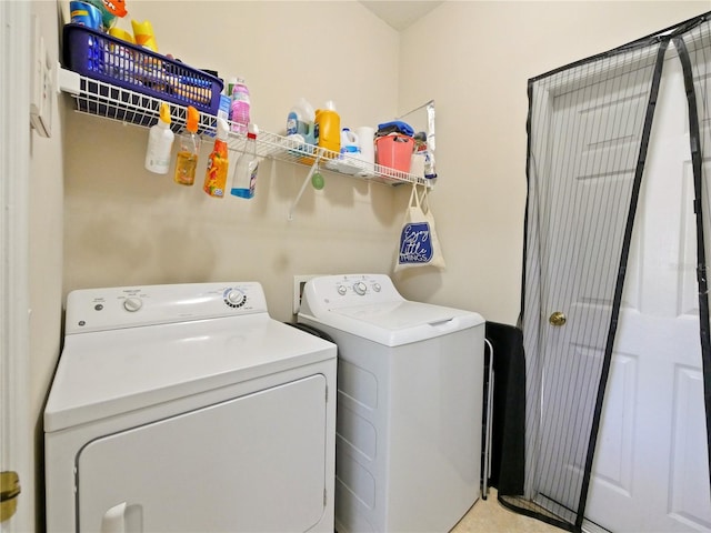 clothes washing area with independent washer and dryer