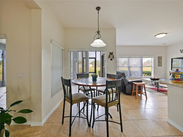 dining room featuring light tile patterned floors