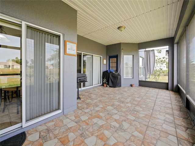 view of unfurnished sunroom