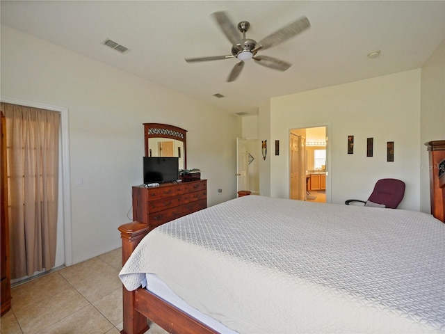 tiled bedroom with ceiling fan