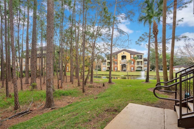 view of yard featuring a water view