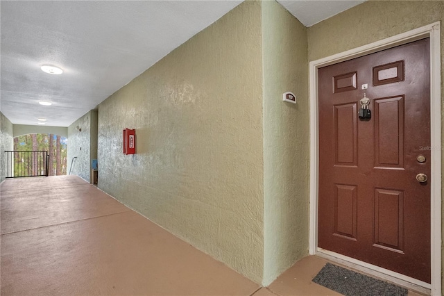 property entrance with covered porch