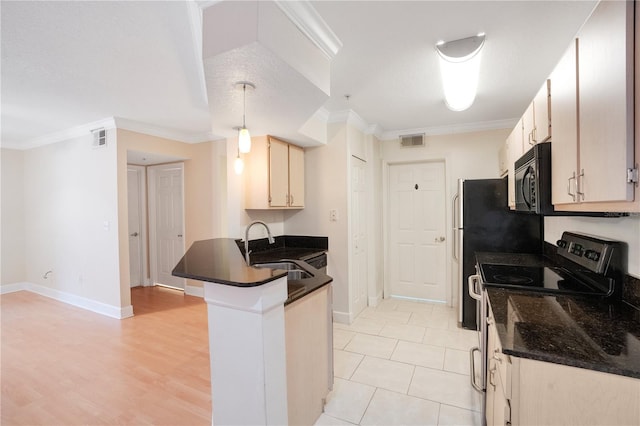 kitchen featuring sink, electric stove, ornamental molding, and a textured ceiling