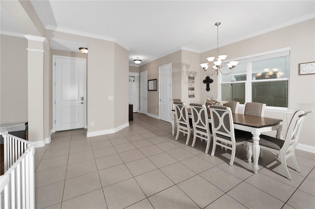 dining area with decorative columns, an inviting chandelier, ornamental molding, and light tile patterned flooring