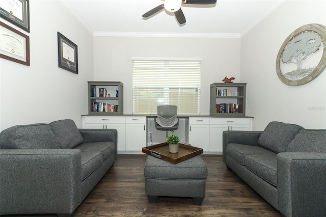 living area with ornamental molding, ceiling fan, dark wood-type flooring, and built in study area