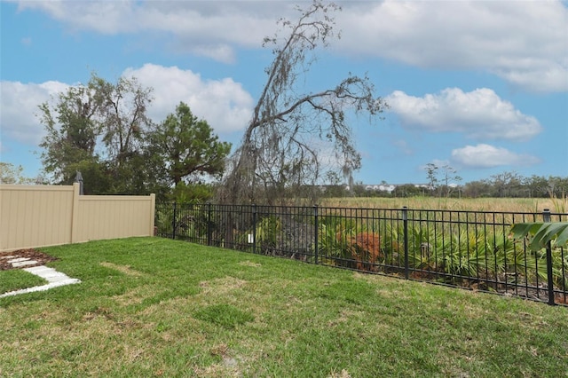 view of yard with fence