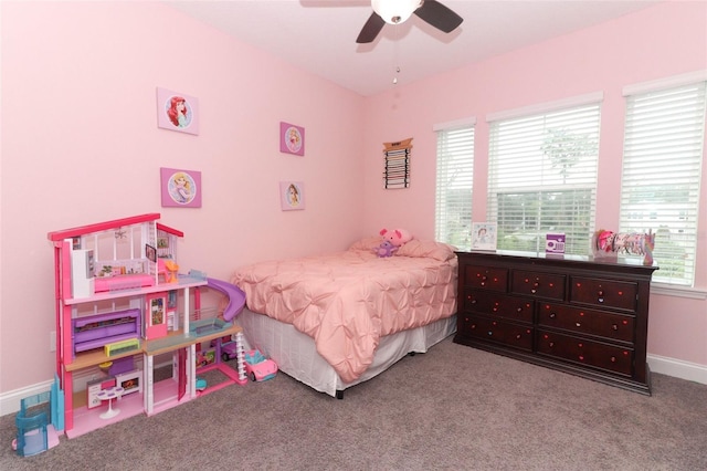 bedroom with light carpet, ceiling fan, and baseboards