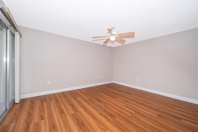 unfurnished room featuring ceiling fan and light wood-type flooring