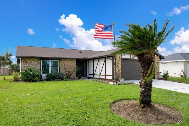 ranch-style home featuring a front lawn and a garage