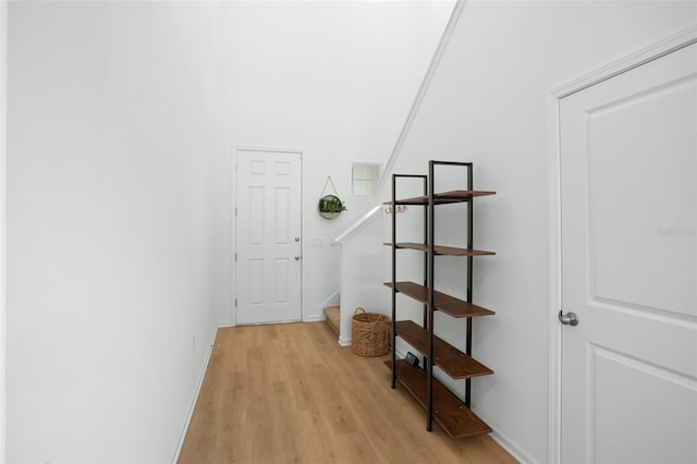 hallway featuring light hardwood / wood-style flooring