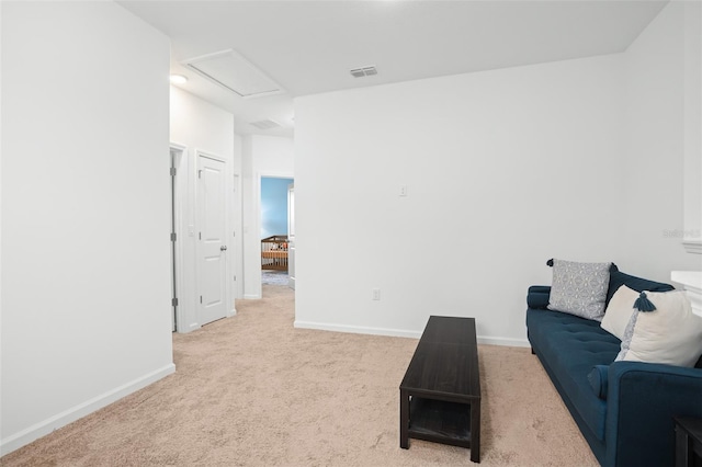 living room featuring light carpet