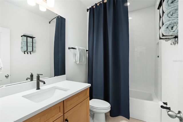 full bathroom featuring toilet, vanity, and shower / tub combo with curtain