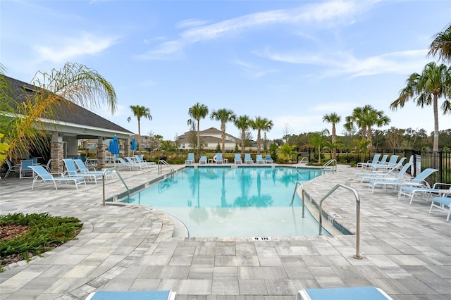 view of pool featuring a patio