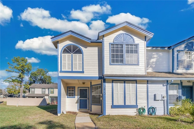 view of front of home featuring a front yard