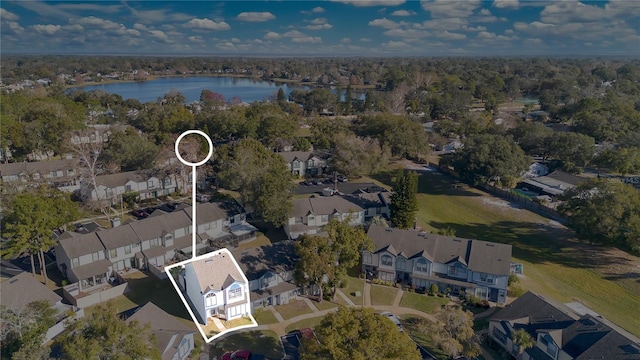 birds eye view of property featuring a water view