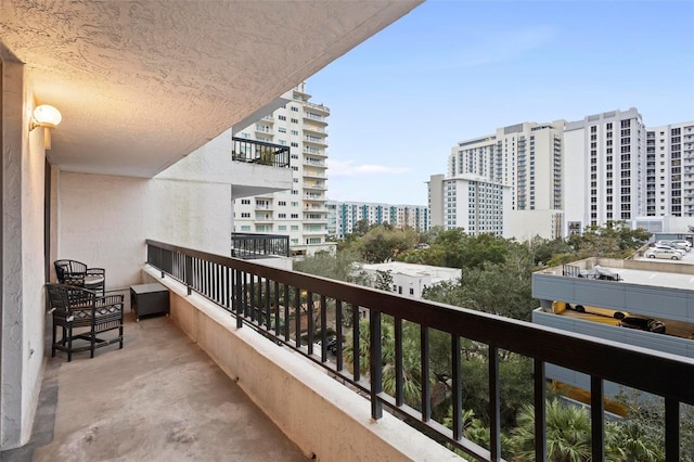 balcony featuring a city view