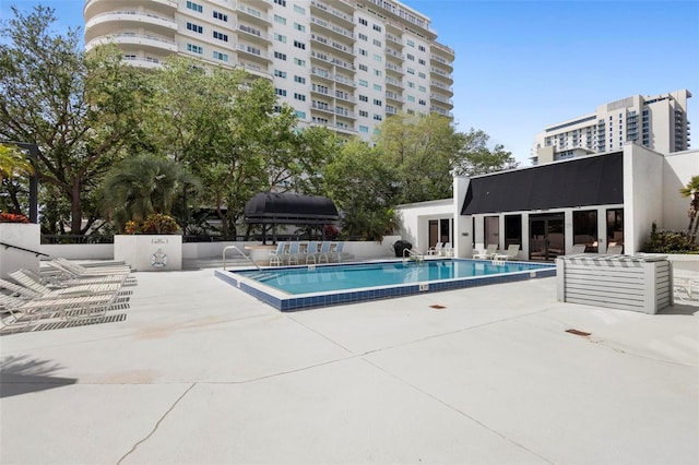 pool featuring a patio area