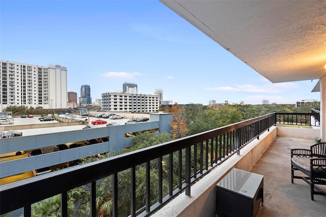 balcony featuring a view of city