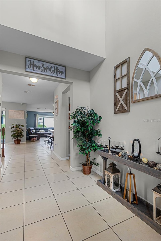 corridor featuring tile patterned flooring