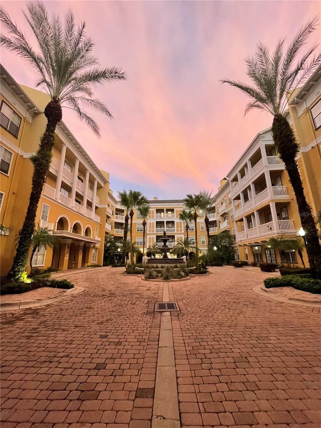 view of property at dusk