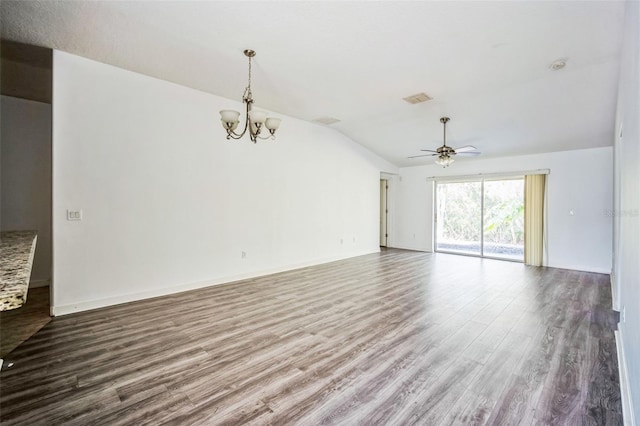 unfurnished living room with lofted ceiling, hardwood / wood-style flooring, and ceiling fan with notable chandelier