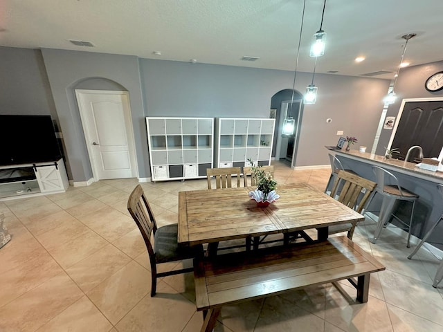 dining room featuring light tile patterned floors