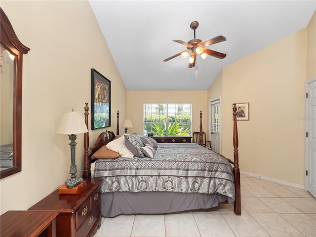 bedroom with lofted ceiling, light tile patterned flooring, ceiling fan, and baseboards