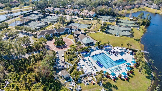 bird's eye view featuring a water view and a residential view