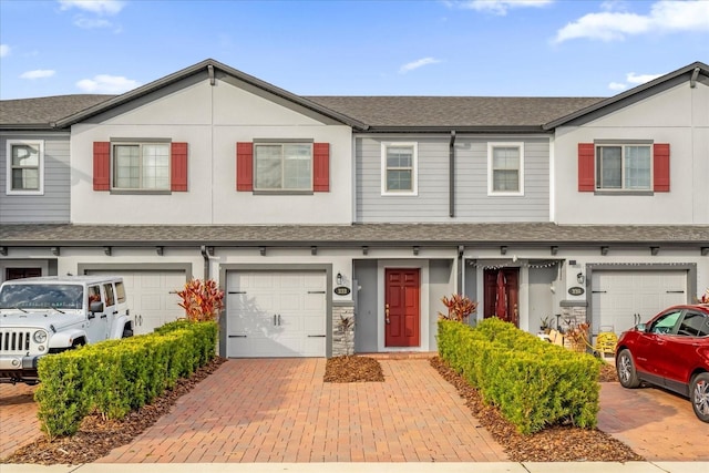 232 Rustic Loop, Sanford, FL 32771 - townhome / multi-family property with a garage