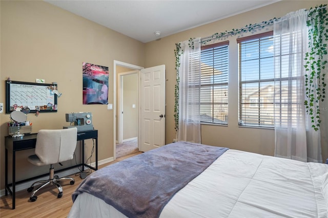 bedroom featuring hardwood / wood-style floors