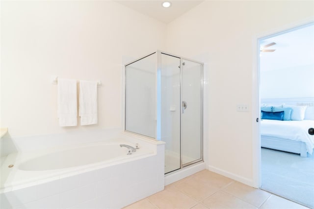 bathroom featuring tile patterned flooring and plus walk in shower