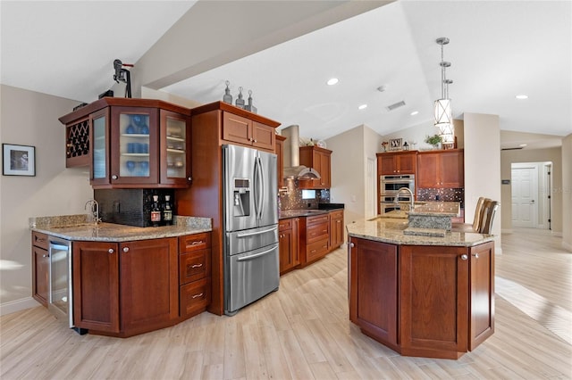 kitchen with decorative light fixtures, stainless steel appliances, exhaust hood, tasteful backsplash, and lofted ceiling