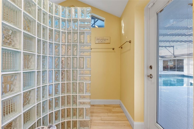 bathroom with hardwood / wood-style floors