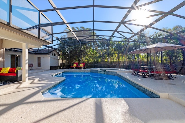 view of swimming pool with a lanai, an in ground hot tub, and a patio