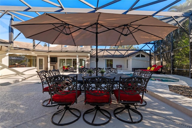 view of patio / terrace with glass enclosure