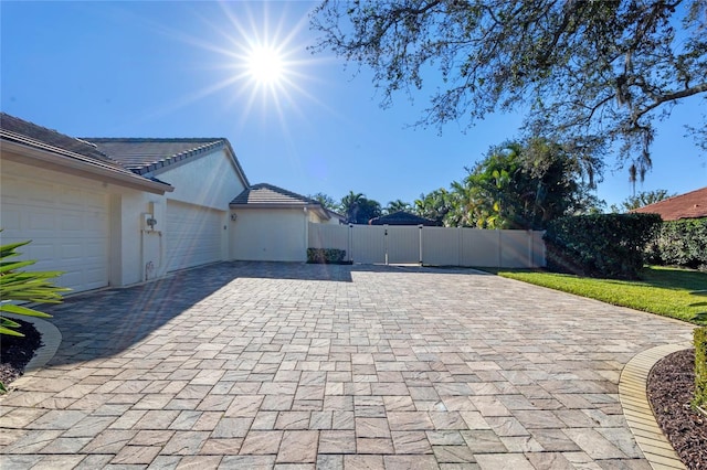 view of patio / terrace featuring a garage