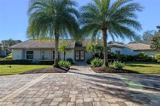 view of front of home with a front yard